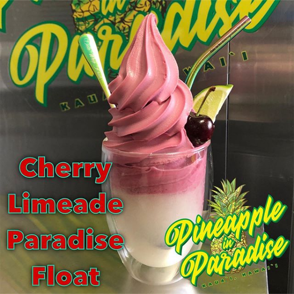Cherry limeade paradise float in a pineapple glass